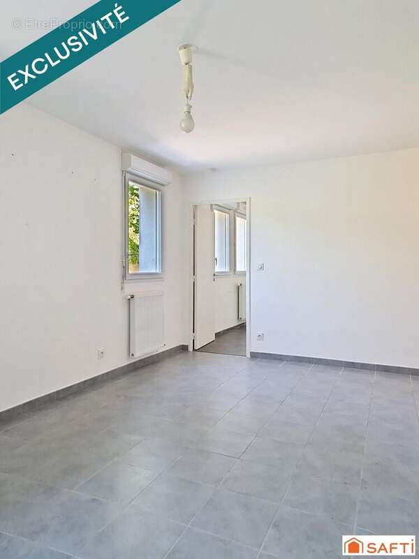 Photo 3 - Appartement à NEUVILLE-SUR-SAONE