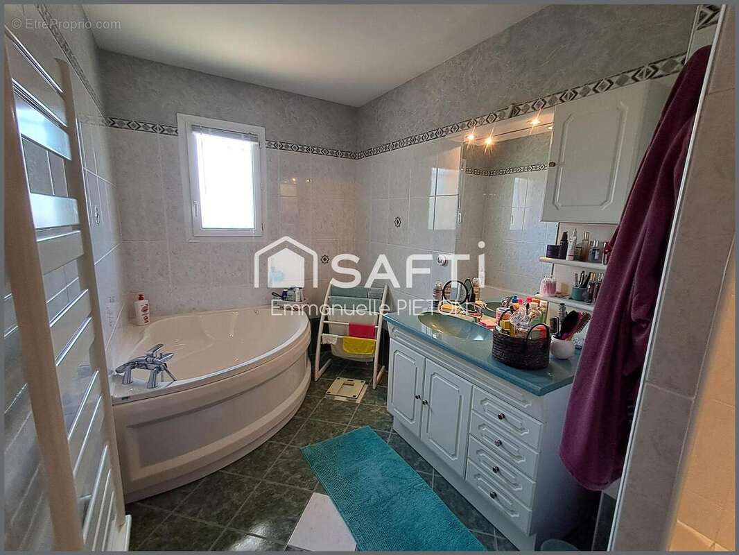 Maison 112 m² à Neuville-De-Poitou  - photo 7