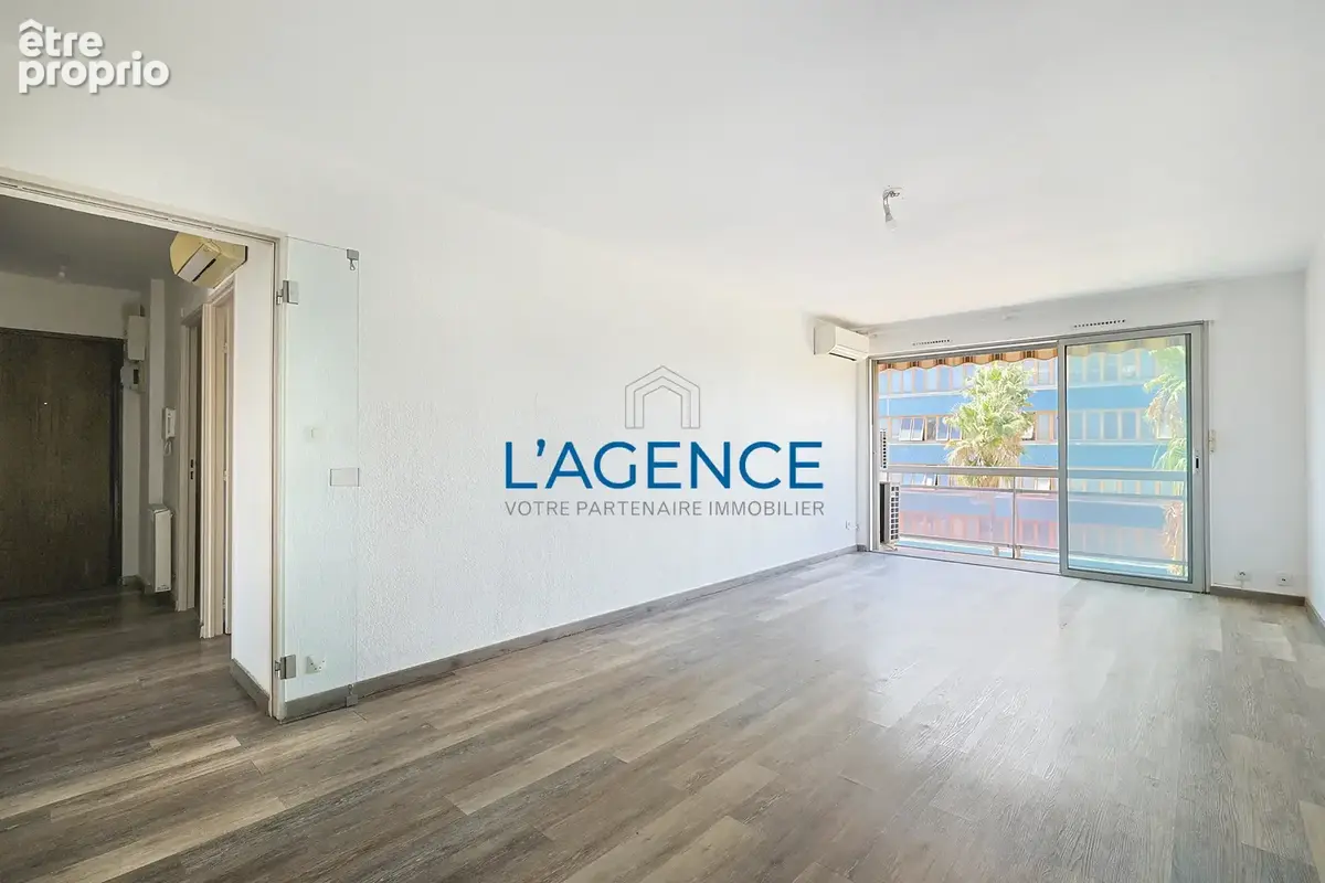 Appartement T4 de 91 m2 en étage avec ascenseur et parking privatif en plein coeur du centre ville - photo 3