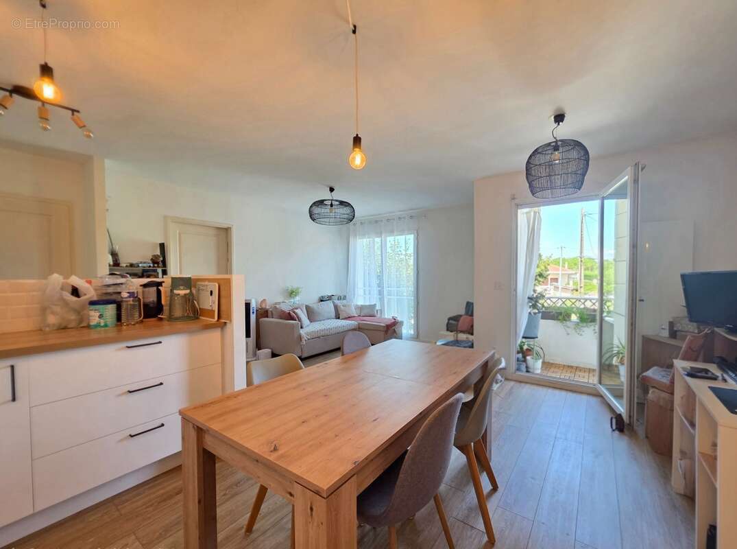 Appartement T2 46m² entièrement rénové, avec parking privatif, à 5min à pied du centre-ville - photo 2