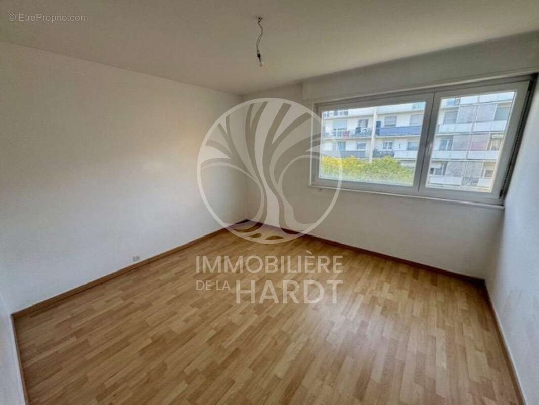 chambre 1 - Appartement à ILLZACH