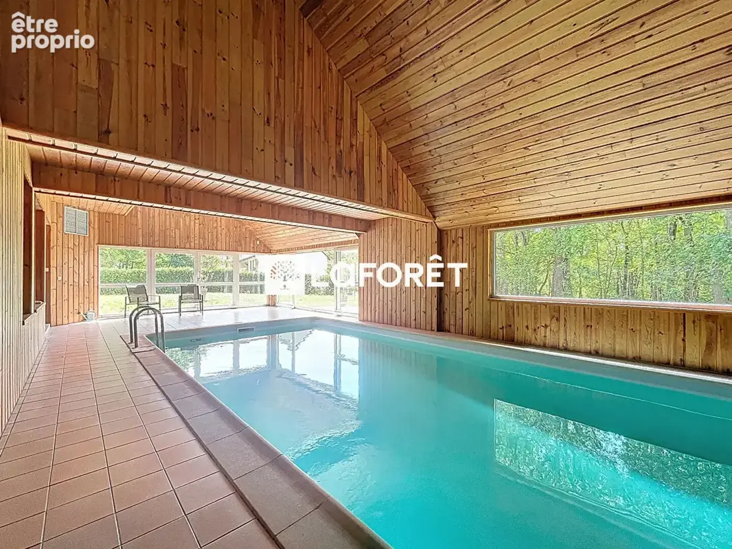 Maison familiale située dans un cadre verdoyant avec grand terrain - photo 14