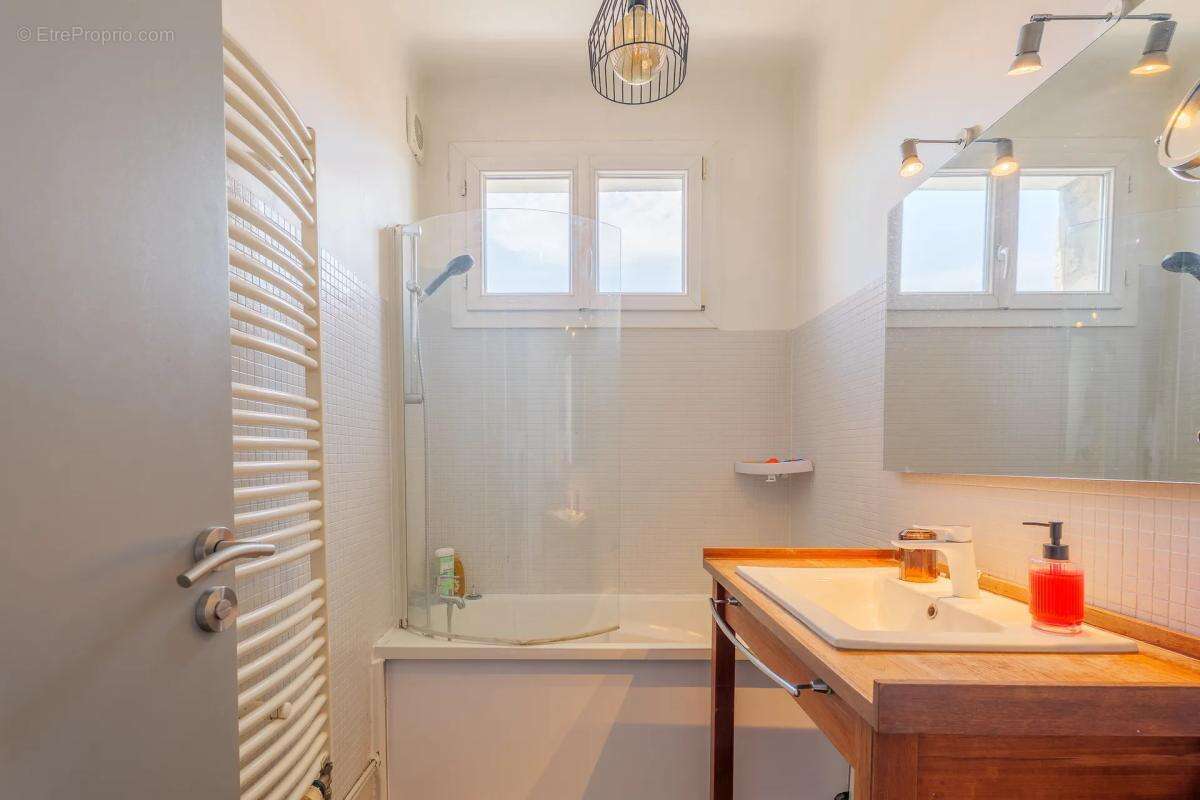 Maison 7 pièces 127 m² à Gagny avec piscine, jardin et parkings - photo 11
