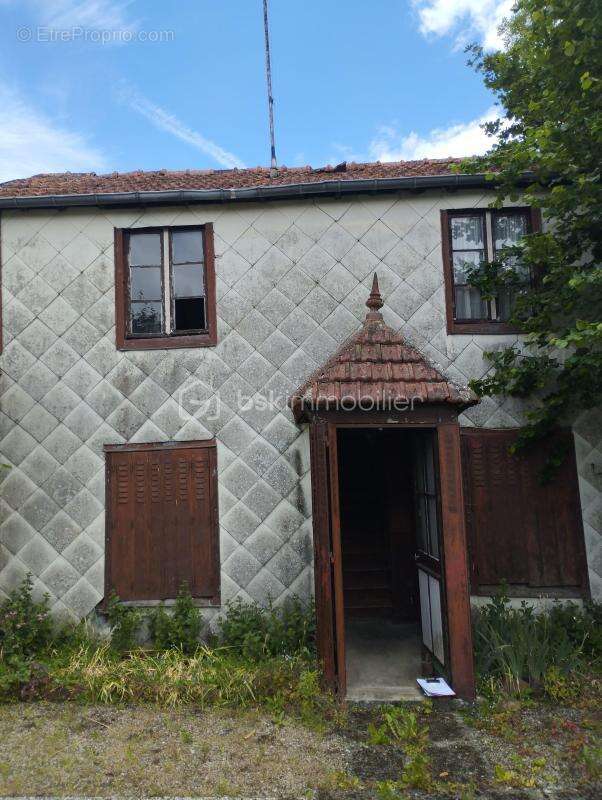 Maison de plain-pied en ville - photo 9