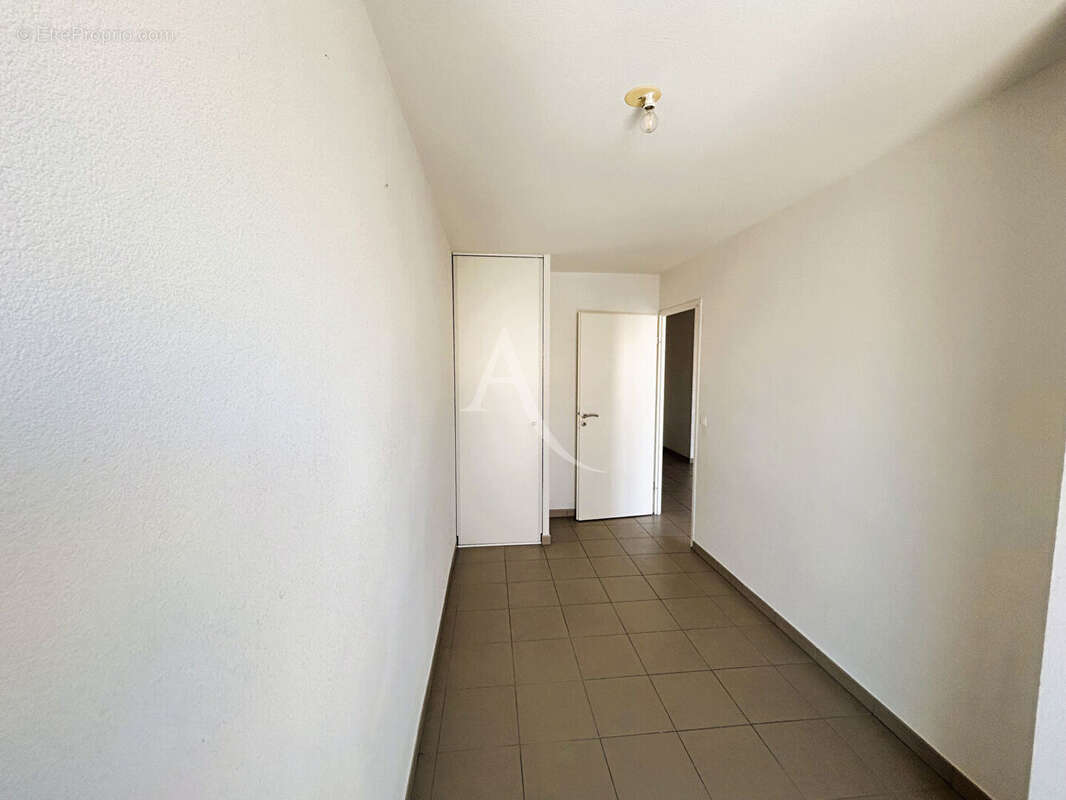 Perpignan Sud, secteur recherché de Porte d'Espagne, appartement 4 pièces 71 m² en très bon état avec 2 places de parking - photo 7