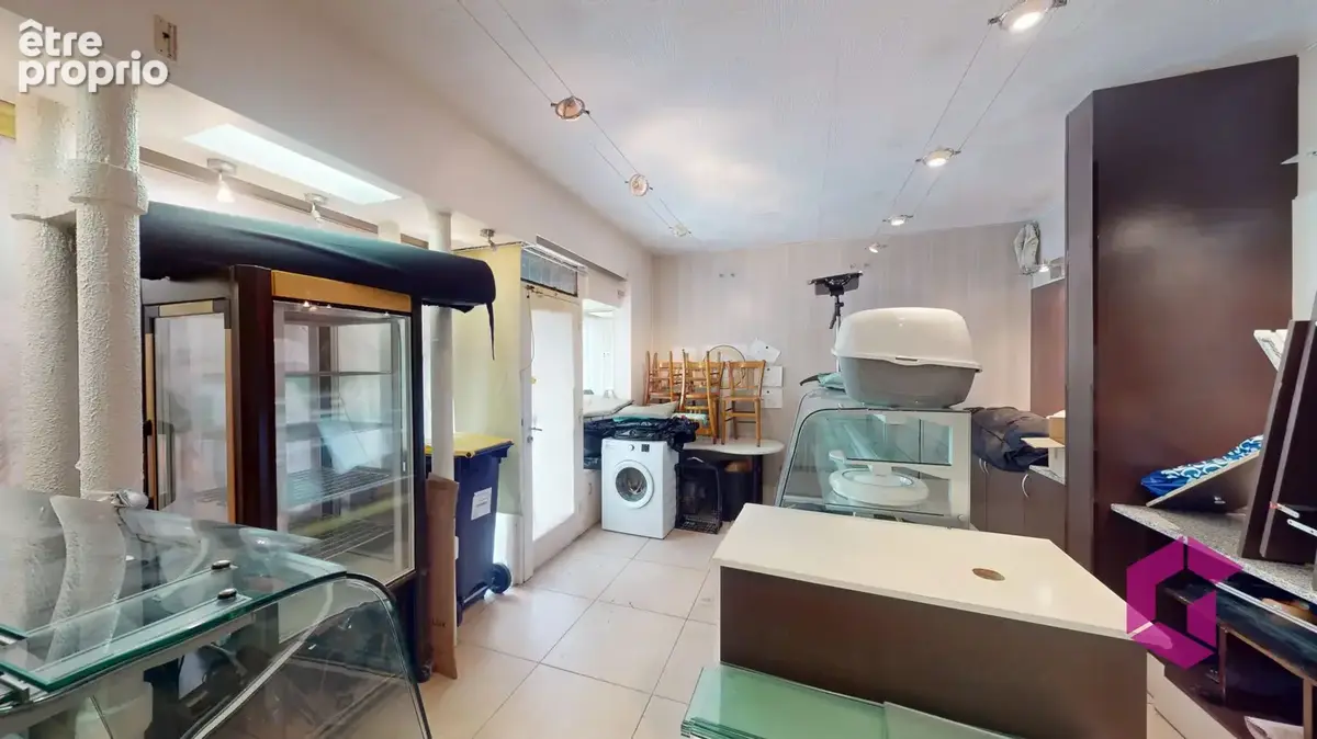 Appartement et local commercial - photo 11