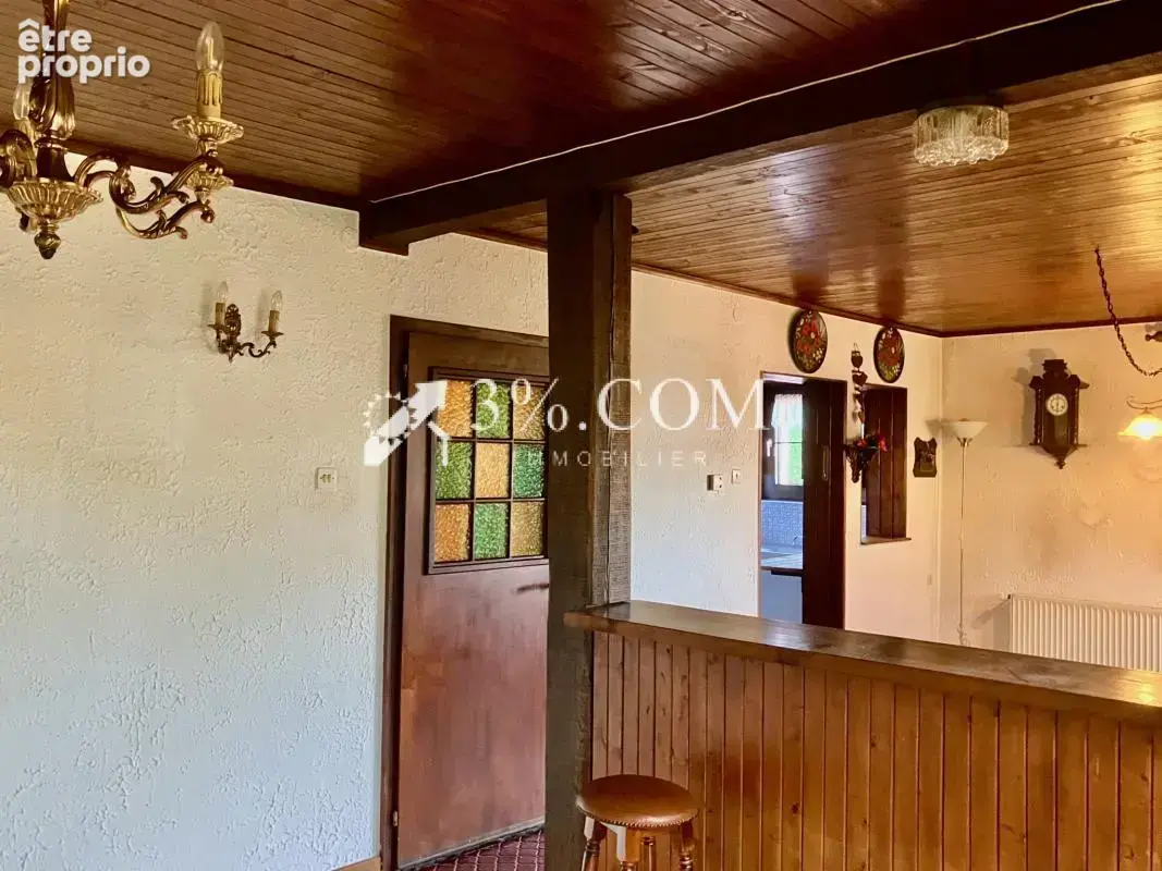Maison sur les hauteurs avec terrain boisé - photo 7