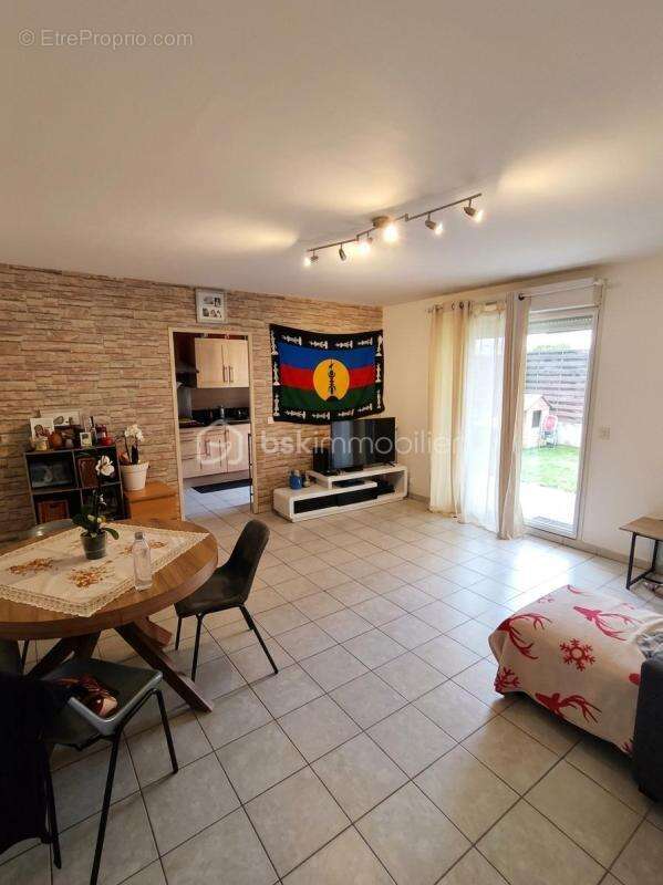 T3 de 67 m² avec jardin-terrasse de 38,5 m² plein sud, parking en sous-sol et résidence sécurisée – Investissement locatif (bail - photo 2