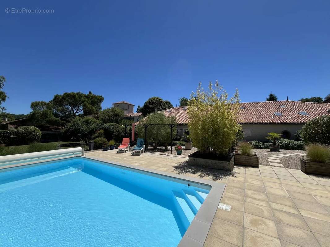 Maison à SAINT-LAURENT-DES-COMBES