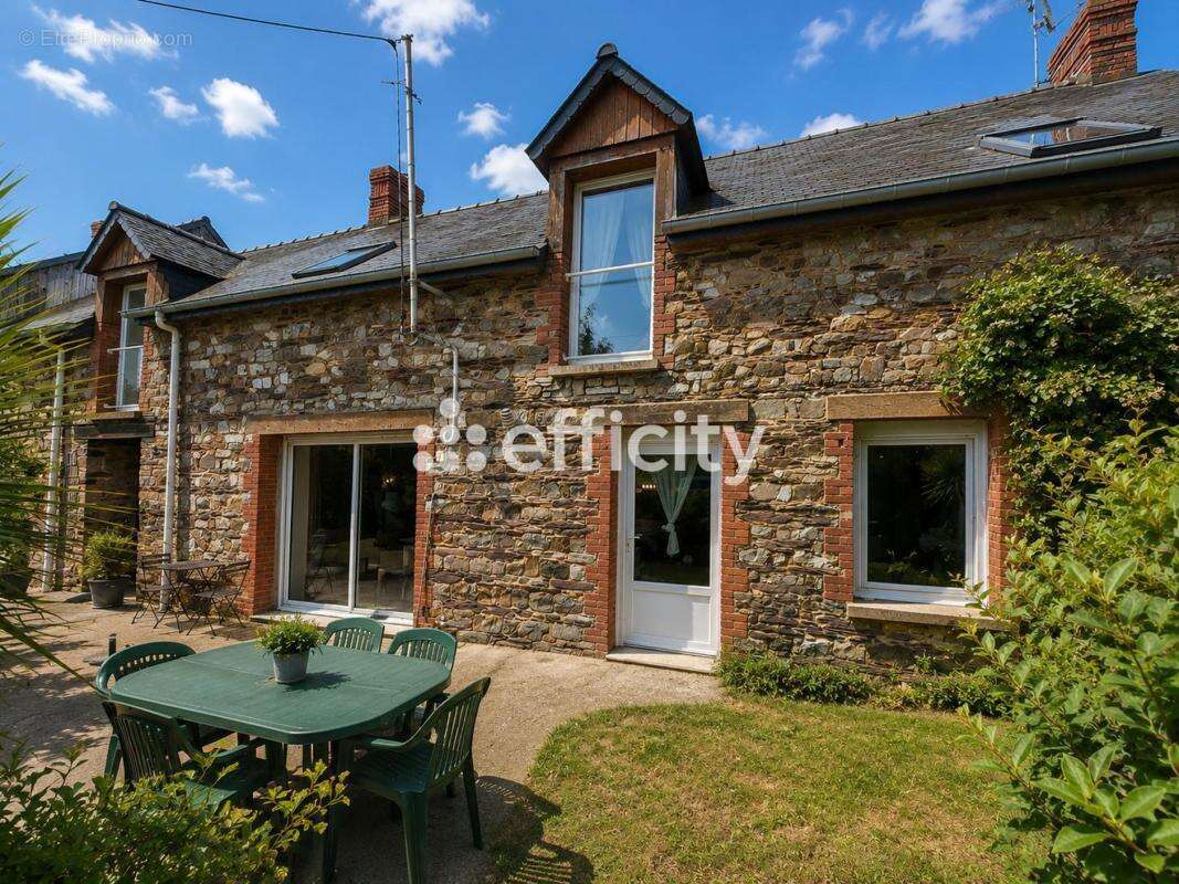 Maison 175 m² à Baulon  - photo 2