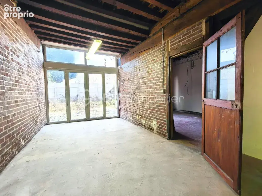Ensemble immobilier (local commercial + appartement) plein centre ville - photo 10