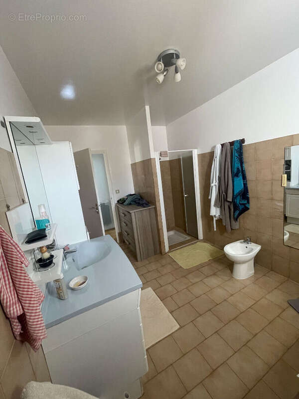 Maison 3 chambres avec véranda, garage et terrain de 578 m²  - Environnement calme - photo 12