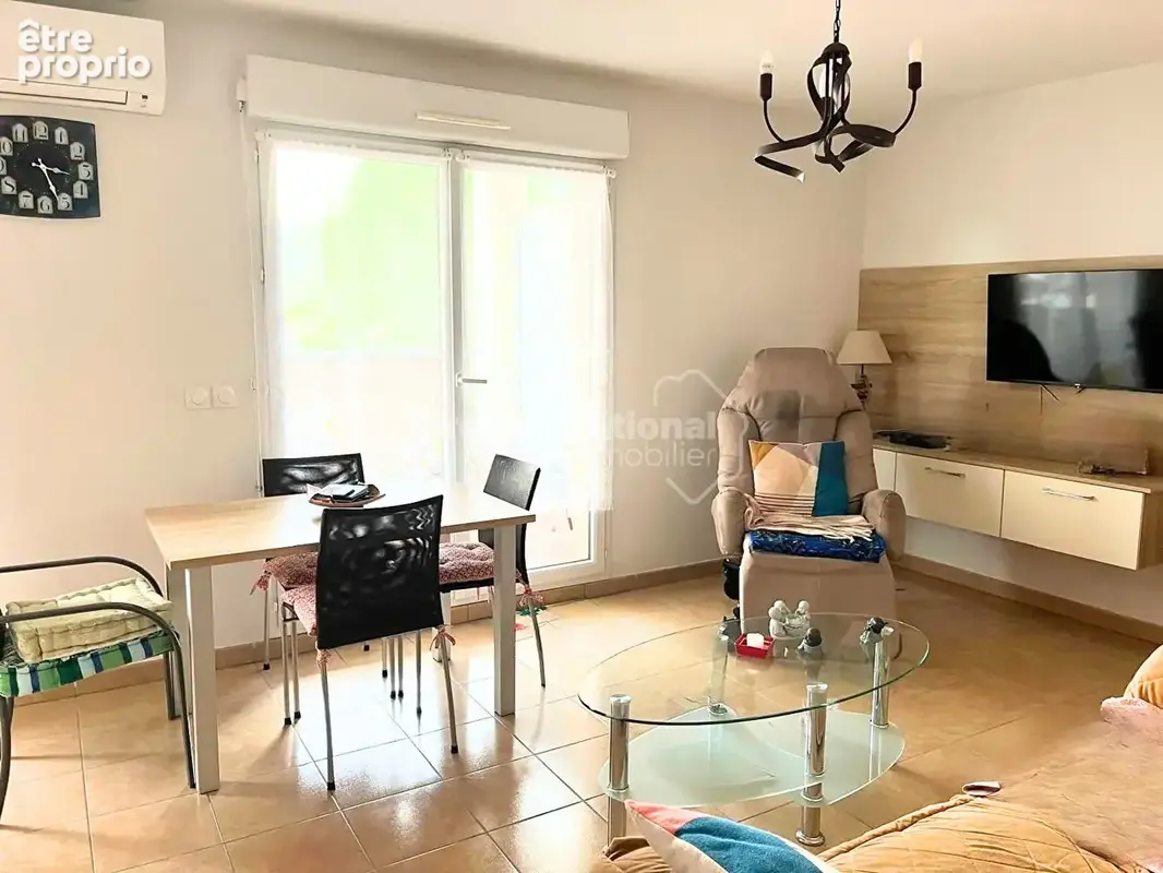 T2 de 44m² climatisé et traversant + 2 places de parkings privatives dans une copropriété prisée - photo 3