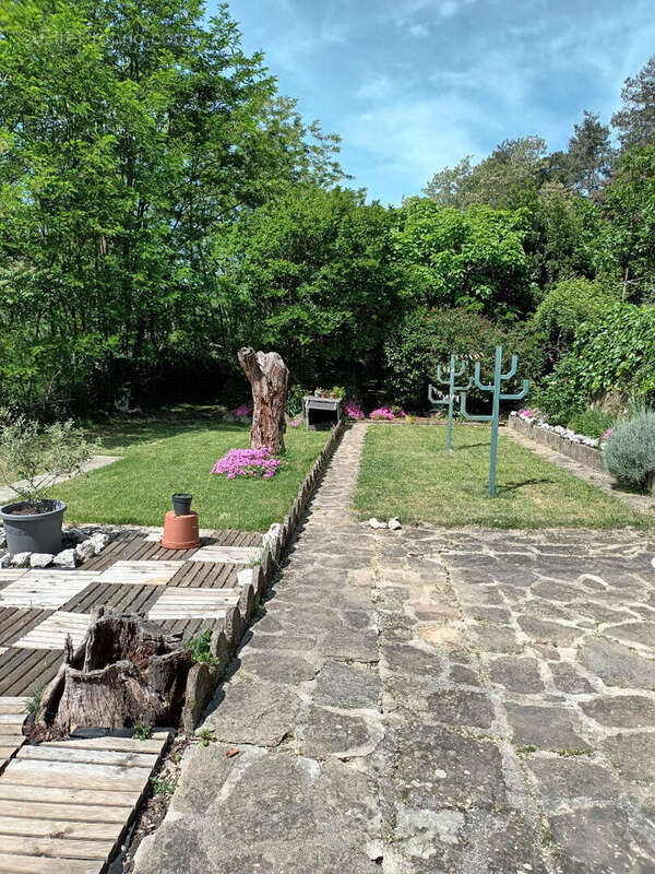Appartement avec grand terrain - photo 11