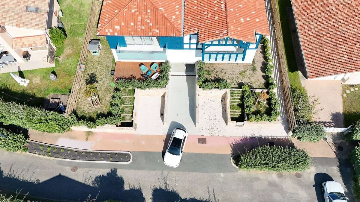 Appartement au 1er et dernier etage de type 3 pièces de 74.91 m2 avec terrasse de 7.50 m2 + 2 parking en sous sol - photo 4