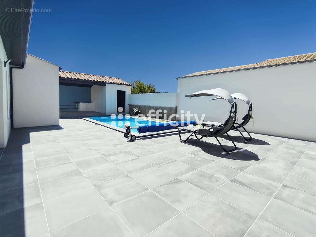 Maison 150 m² à Dompierre-Sur-Mer  - photo 12