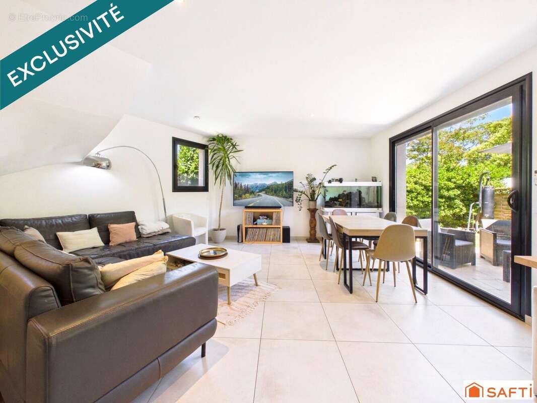 Maison 115 m² à Villeneuve-Tolosane  - photo 2
