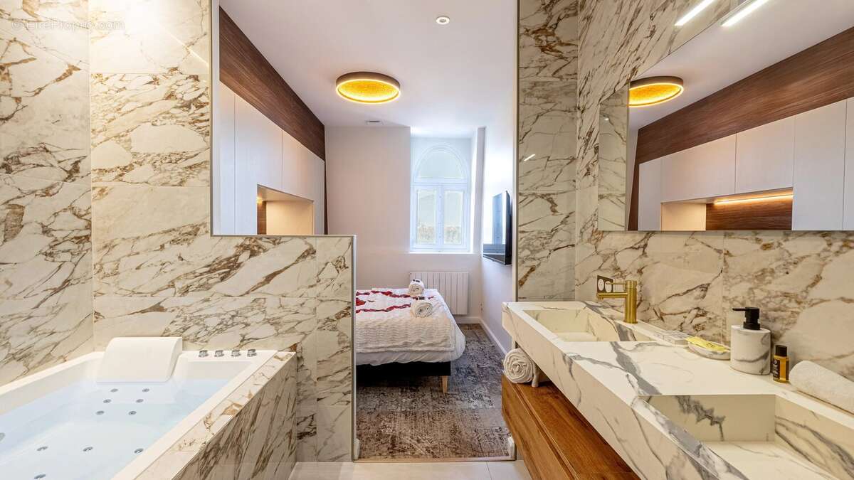 En exclusivité – Magnifique appartement T2 rénové avec prestations haut de gamme - photo 7