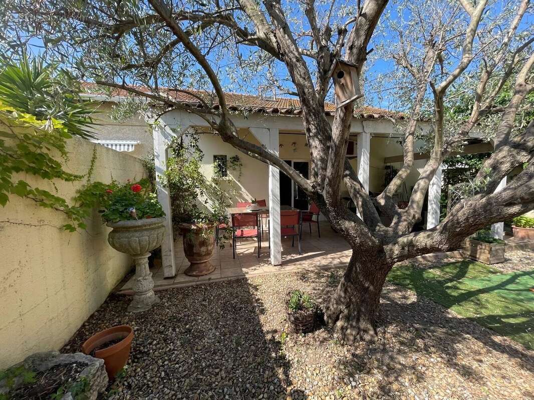Maison F4 avec jardin et garage - photo 2