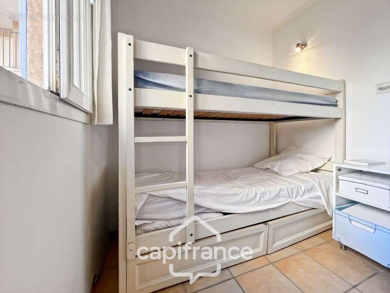 appartement REZ de JARDIN,résidence du lac, 31 m2, chambre ouverte, grande salle de douche, rangements, cave collective - photo 17