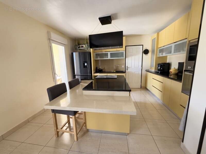 Maison de 5 pièces principales - photo 3