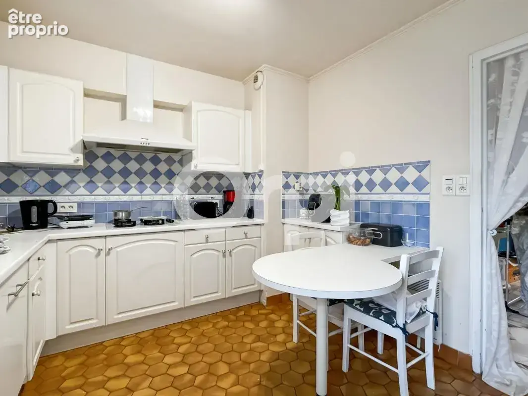 Maison de 109 m² 4 chambres - photo 5