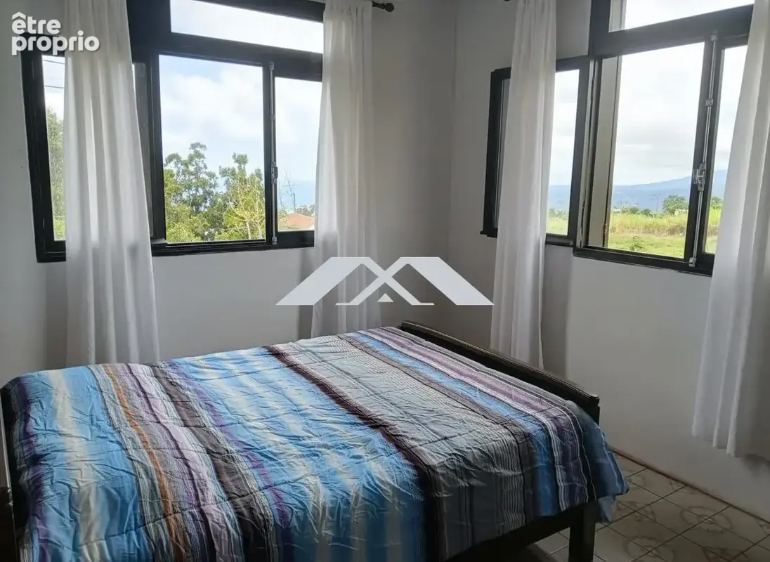 Maison 4 pièces 88 m² à vendre à Le Tampon (97430) - photo 6