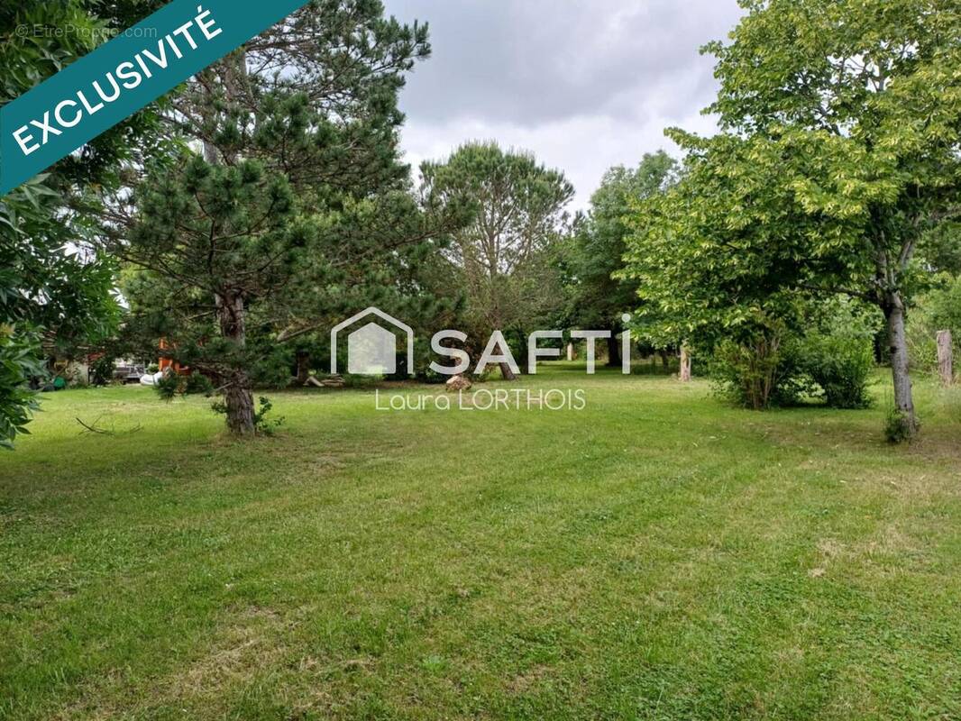 Photo 1 - Terrain à DREMIL-LAFAGE