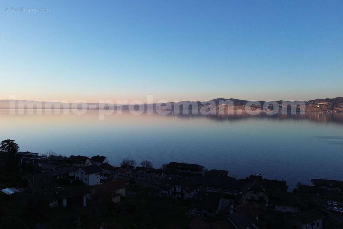 Maison_individuelle_Saint_Gingolph_proche_frontière_Suisse_Lausanne_Vallais_villa_volume_vue_Lac_léman_montagne_commodité_salon_séjour_cuisine_idéal_investisseur_vue_lac_montagnes - Maison à SAINT-GINGOLPH