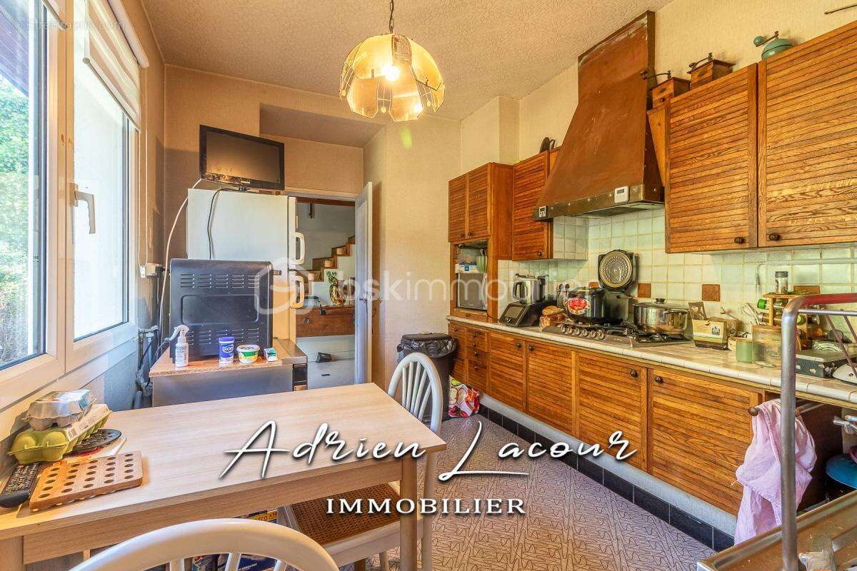 Jolie maison sur sous-sol avec son parc arboré - photo 6