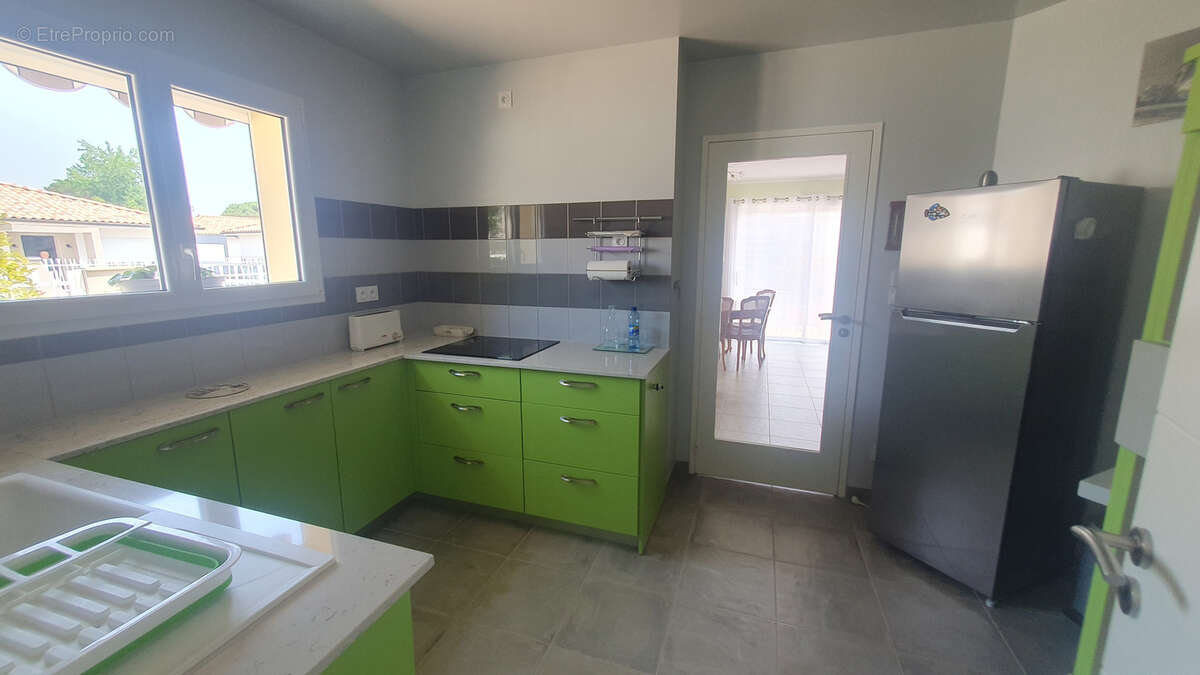 Au Centre Ville de Hagetmau Villa de 106 m2 Hab - photo 4