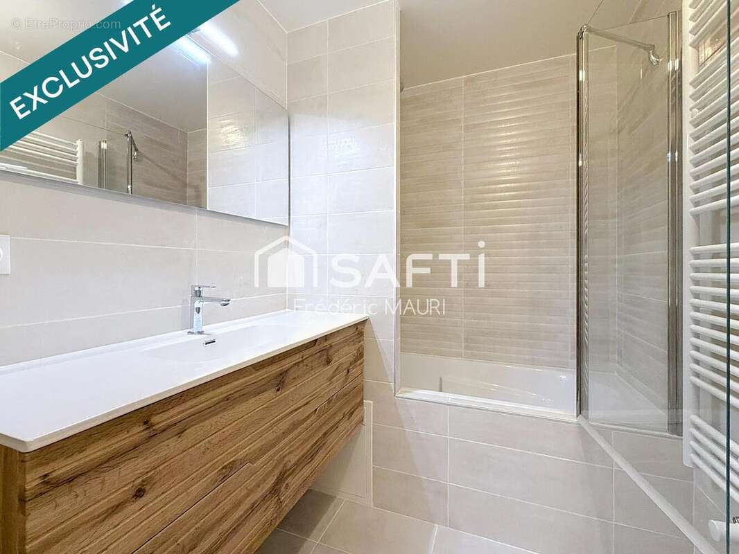 Photo 8 - Appartement à COURBEVOIE