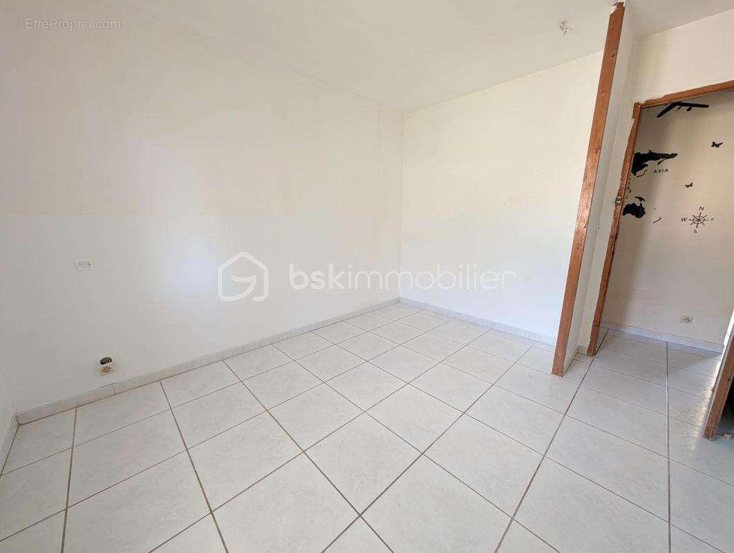 Pavillon de plain-pied de 110 m² sur une parcelle arborée de 1 339 m² - photo 12