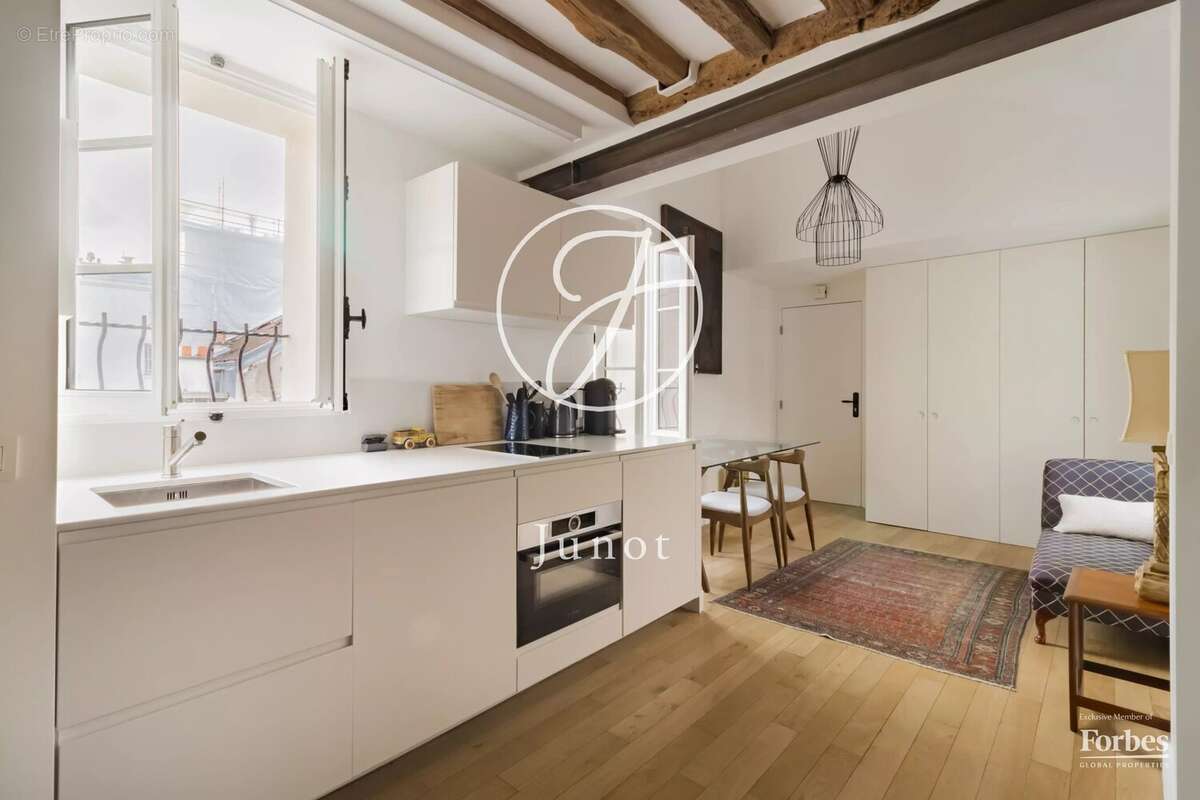 Paris 7e - CARRÉ DES ANTIQUAIRES - Duplex à vendre - 2 pièces - 39,24m² Carrez - 57,53m² au sol - 1 chambre - Dernier étage. - photo 10