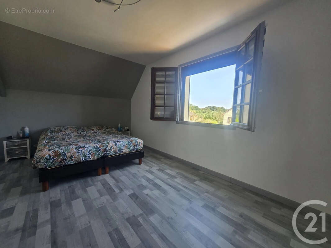 Maison 100 m² à Villers-En-Ouche  - photo 8