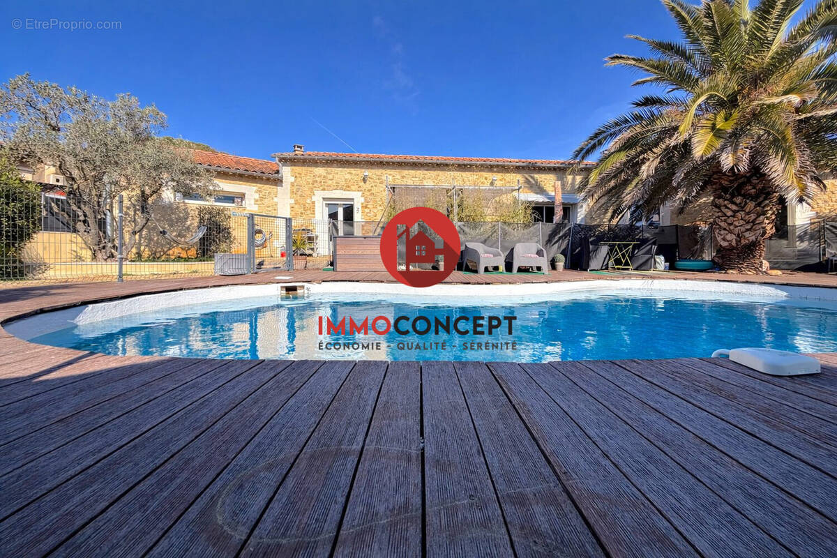 Maison à LAUDUN-L'ARDOISE