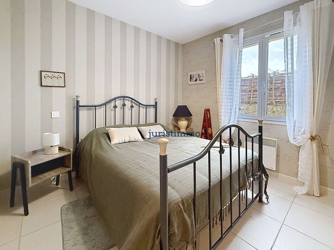 A 1,5 kms du centre ville-maison de plain-pied-3 chambres-piscine-520 m2 de terrain - photo 11