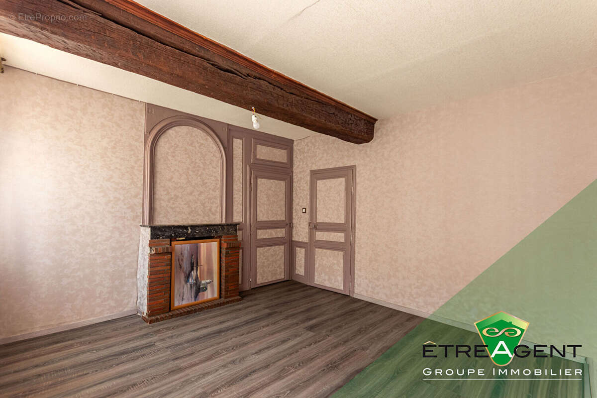 Maison DAMVILLE CENTRE-VILLE - 142 m² - 3 chambres - photo 10