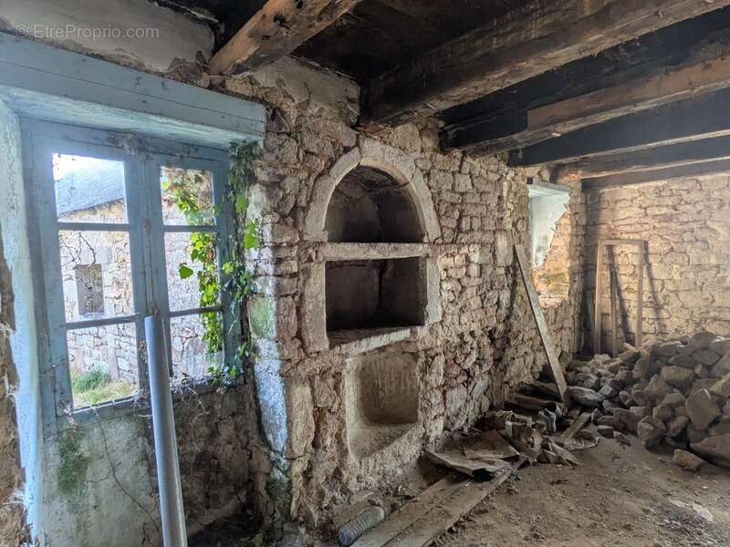 Plouay maison en pierre sous ardoises 1 pièce de 50m² environ parcelle de 140m² environ avec un puits - photo 5