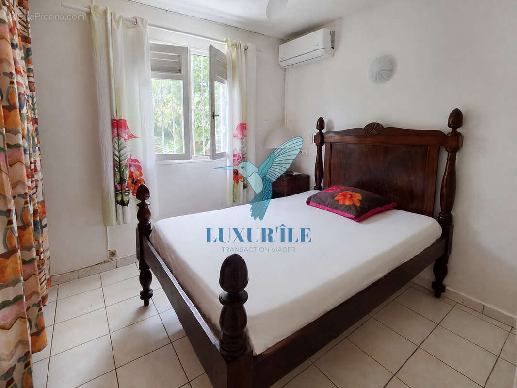 Baie-Mahault   Secteur recherché de La Jaille  Superbe villa T4 avec piscine et jardin - photo 9