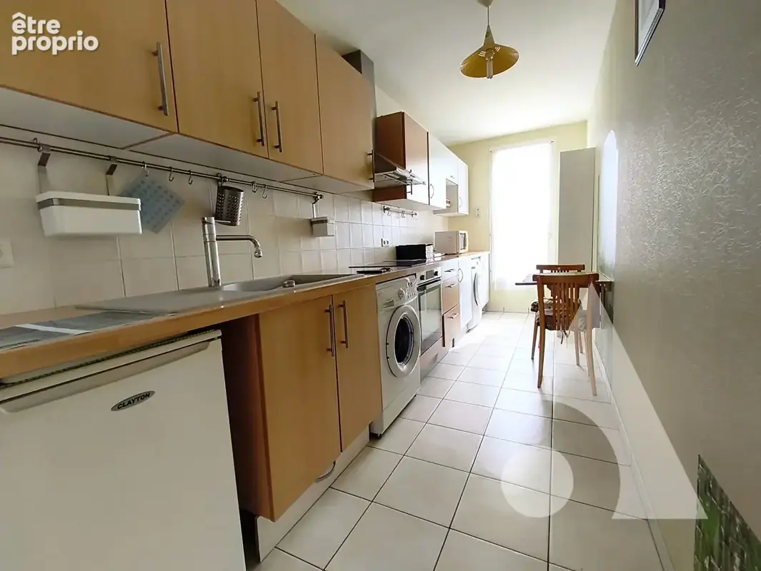 Appartement centre ville - 3 chambres - balcon - parking - photo 3