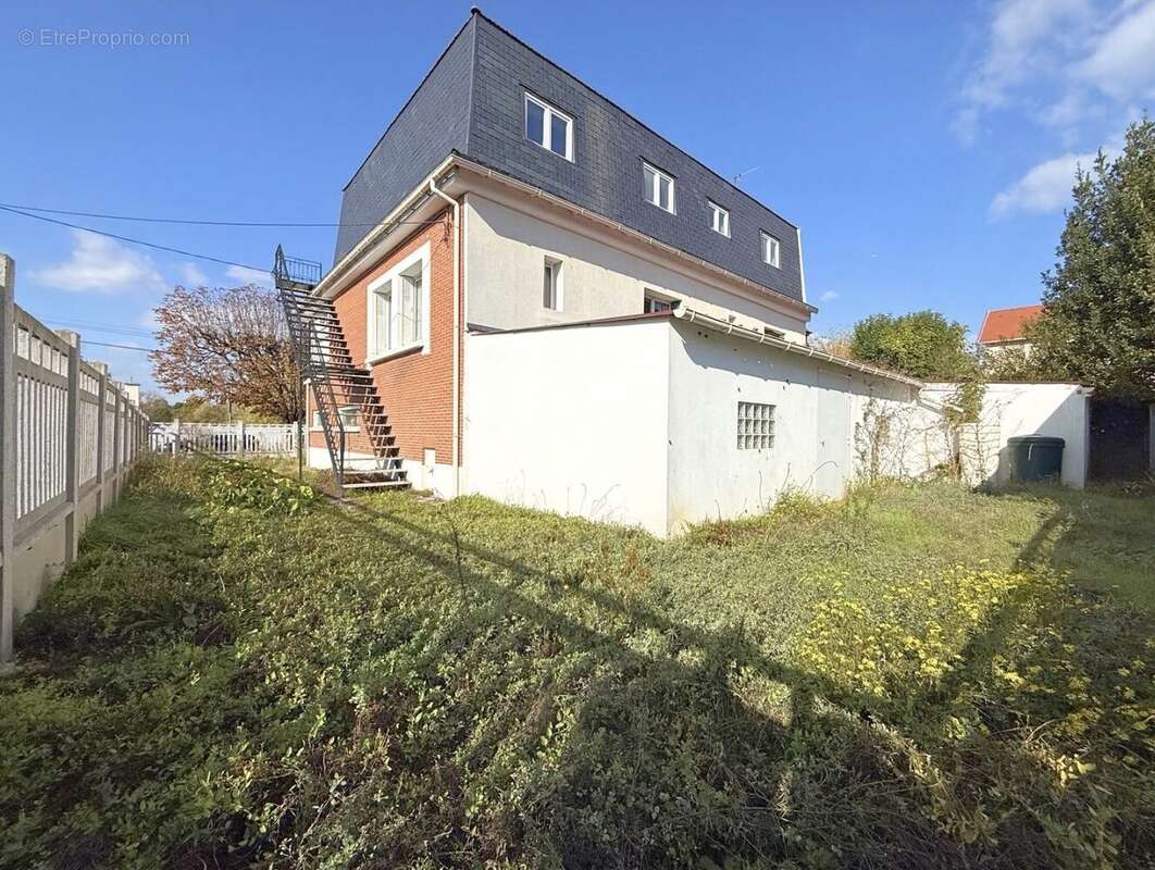 Maison à SARTROUVILLE