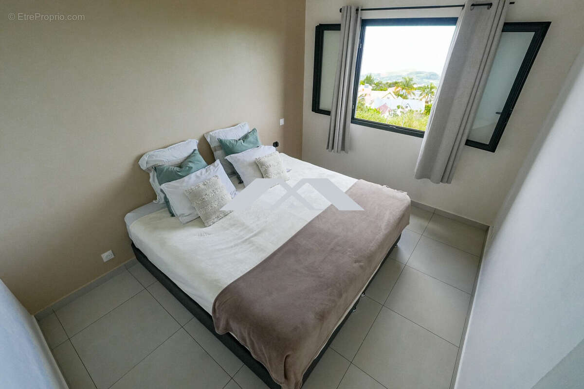 Maison 101 m² à Saint-Joseph  - photo 9