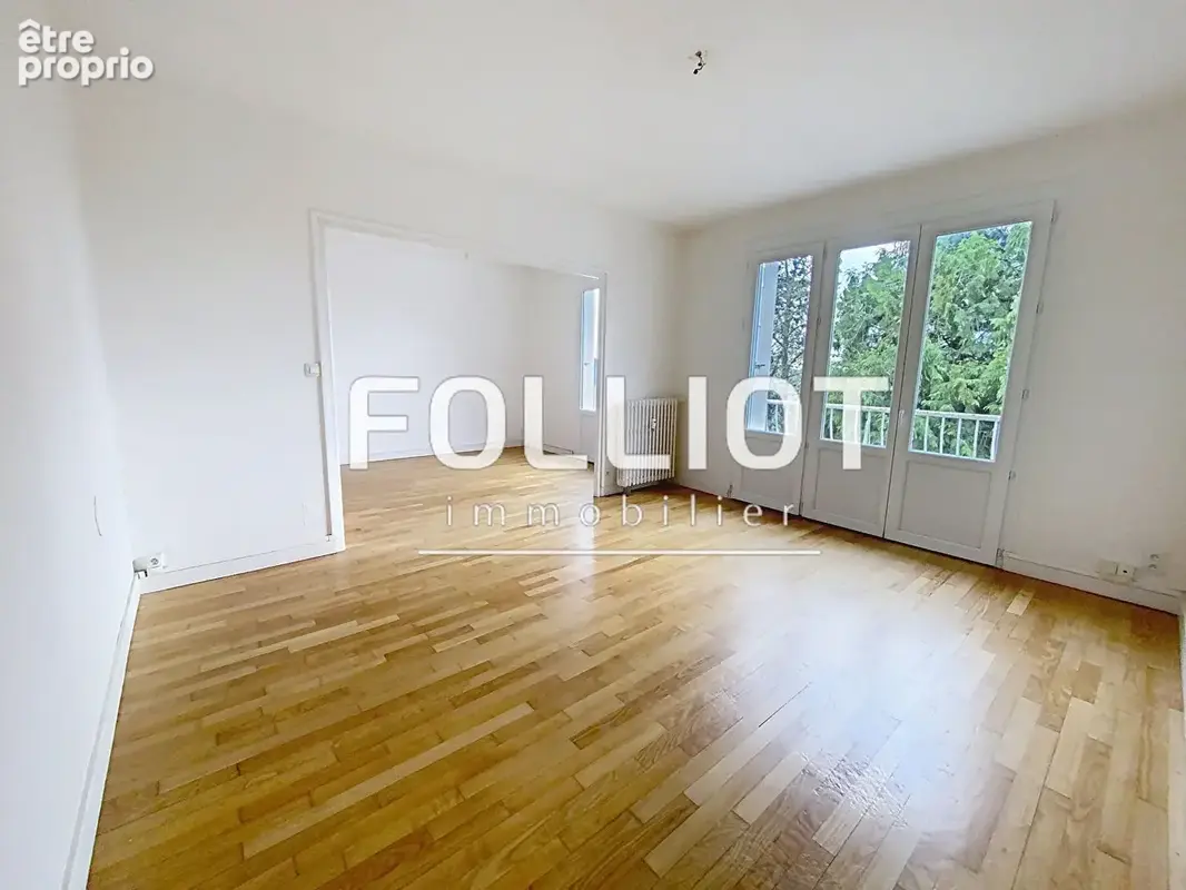 A VENDRE - Appartement lumineux T4 à FOUGERES - photo 2