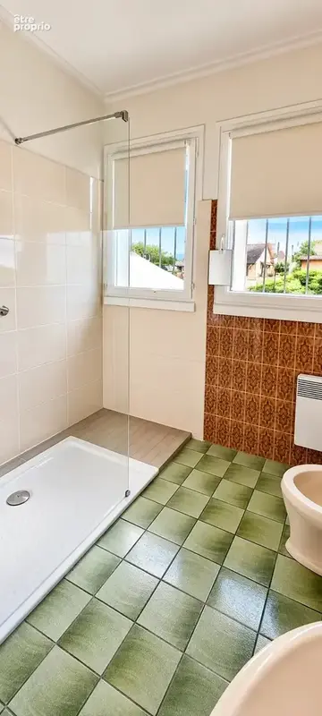 Maison plain pied avec terrasse couverte et  garage sur jardin de 1200 m² - photo 12