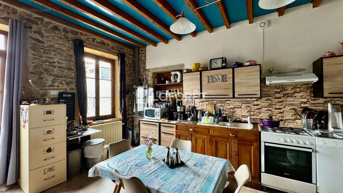 Maison à SOURCIEUX-LES-MINES