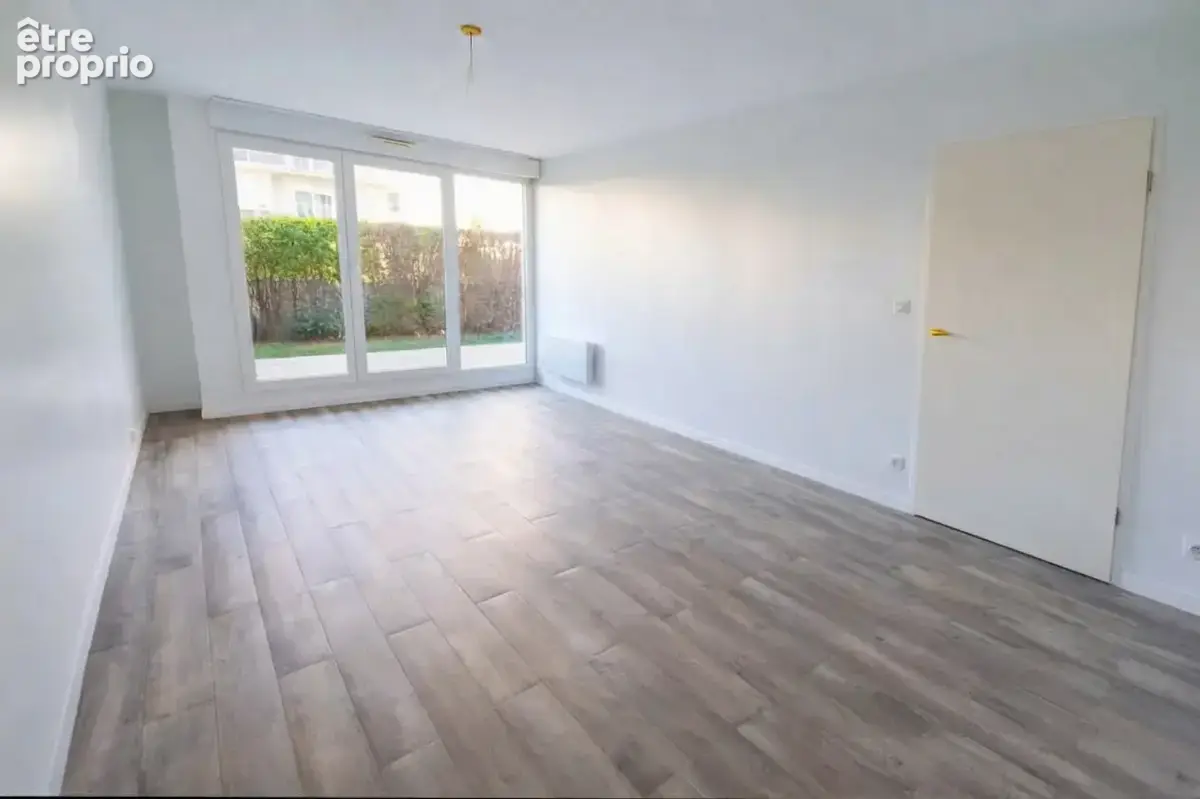 Élégance en rez-de-chaussée avec terrasse et jardin privatif - photo 2