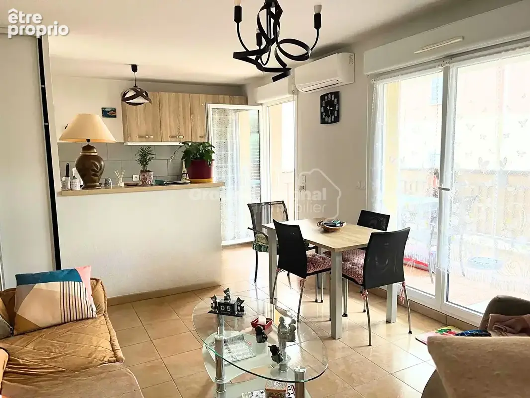 T2 de 44m² climatisé et traversant + 2 places de parkings privatives dans une copropriété prisée - photo 4