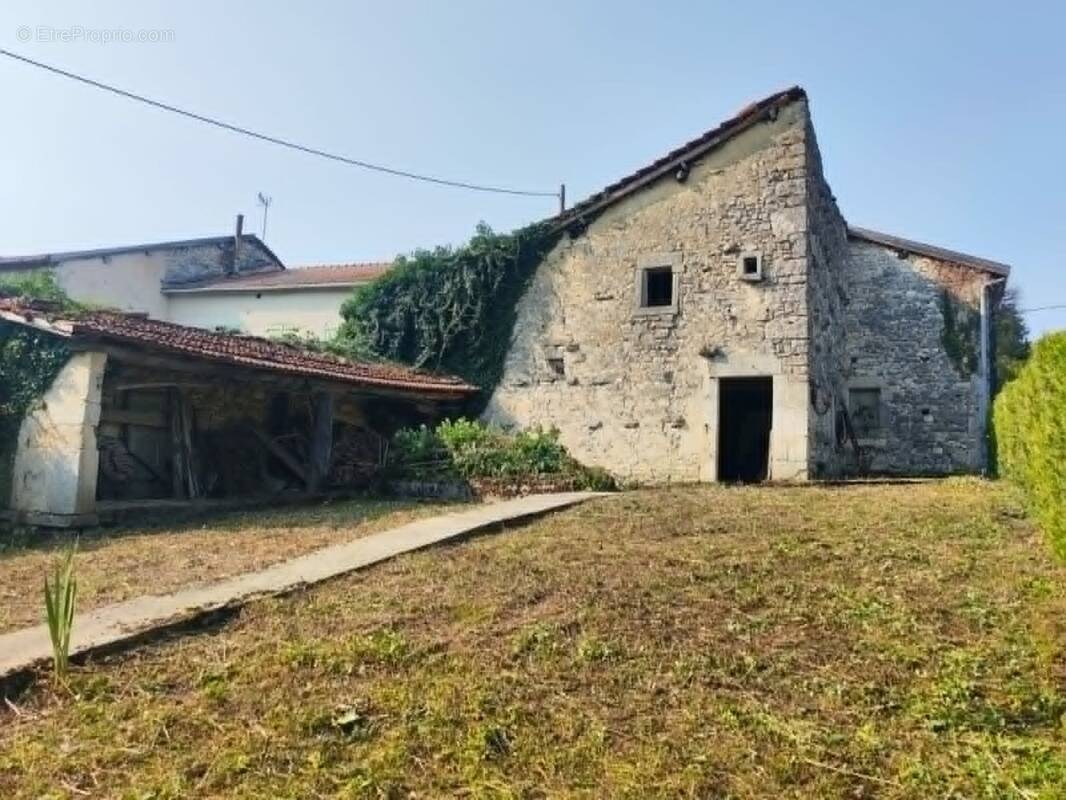 Maison à MENAUCOURT