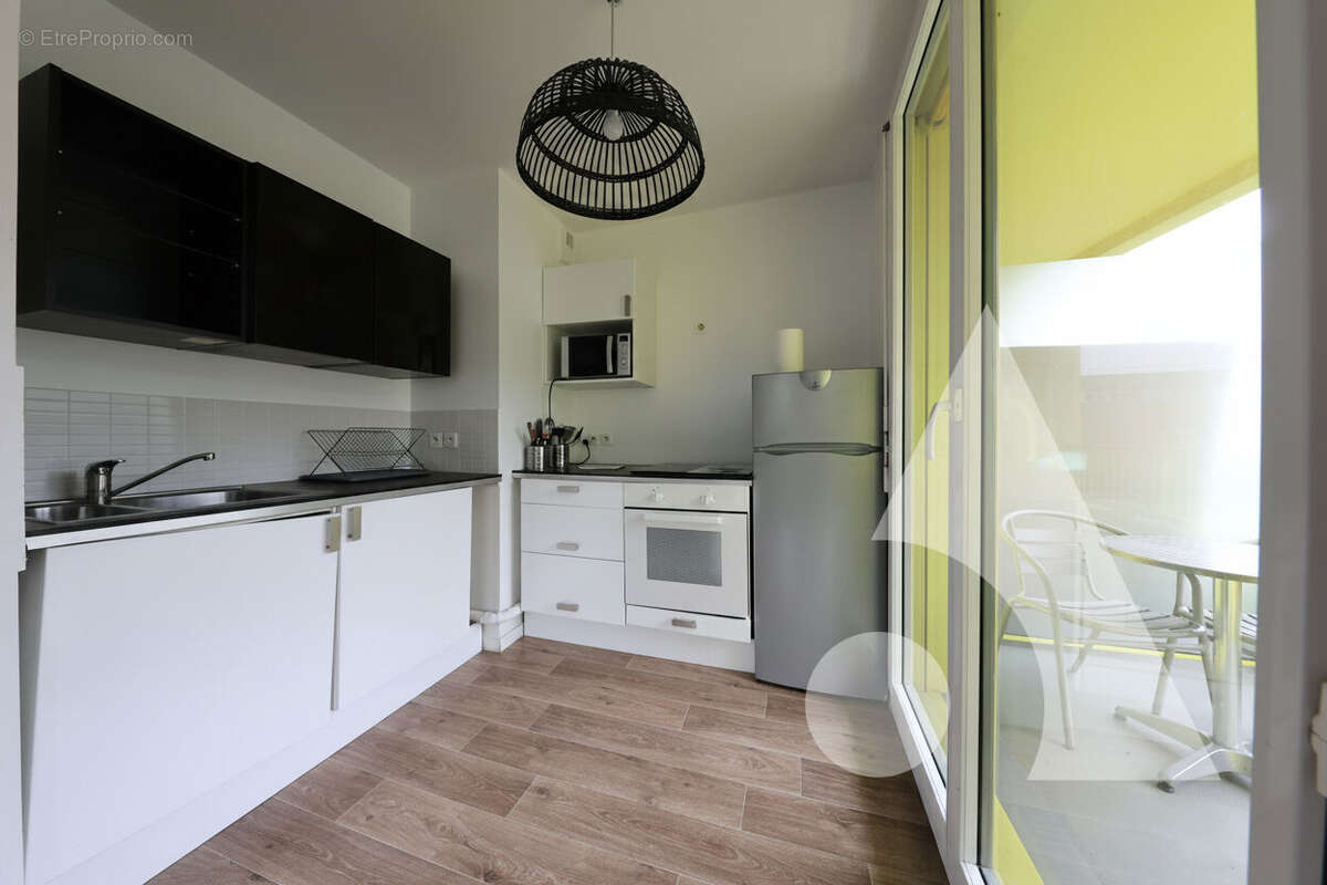 F2 avec balcon + Parking privé en Centre-ville - photo 3